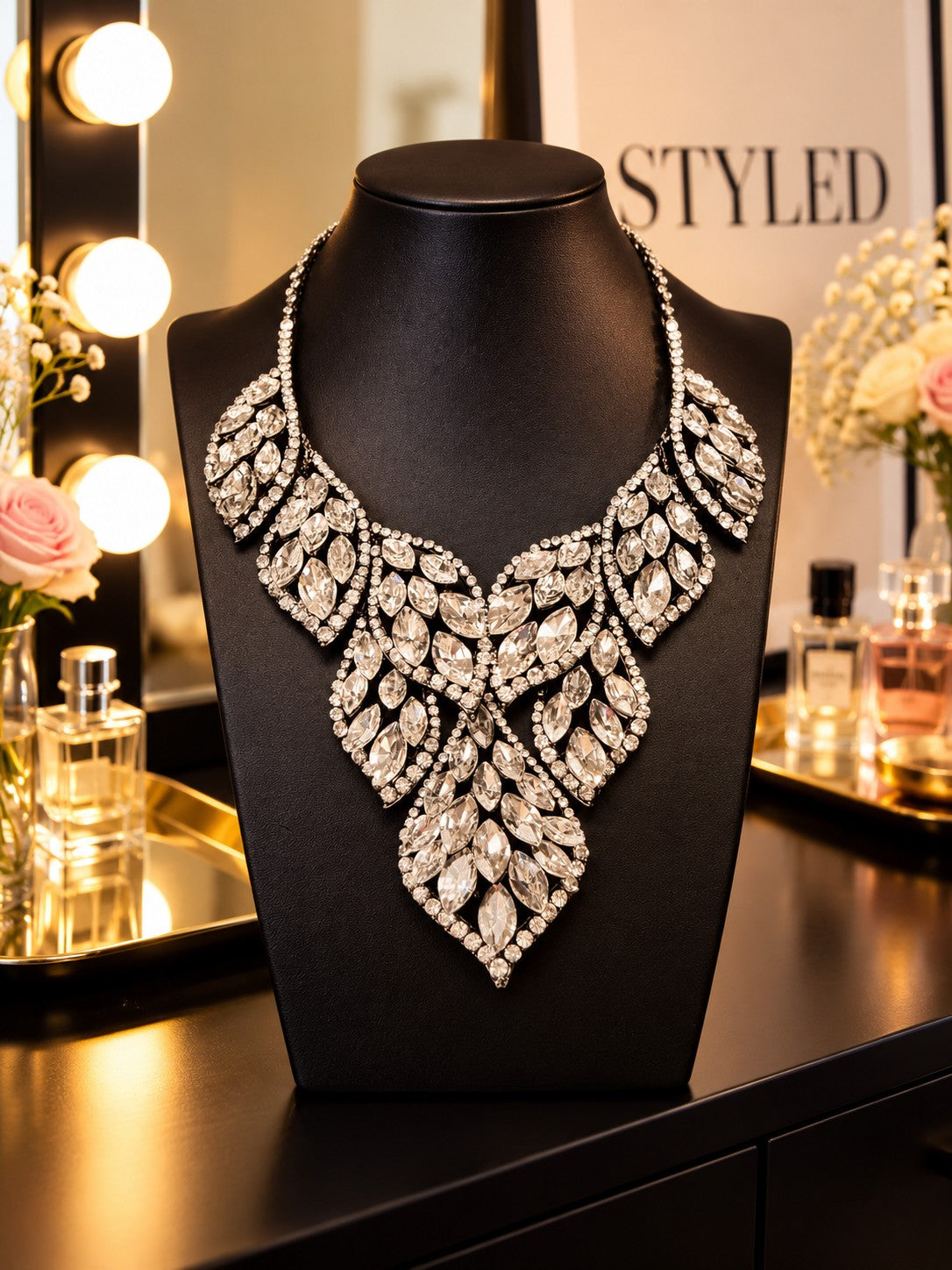 Art Gallery statement bib necklace with clear marquise crystal leaf clusters on a silver tone setting
